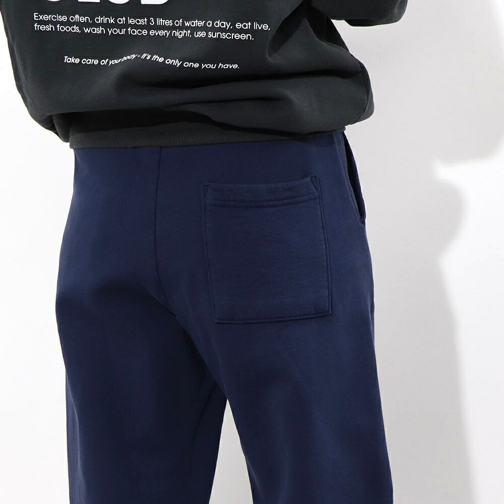 スポーティー&リッチ Sporty&Rich ボトムス ロングパンツ ユニセックス ネイビー コットン 裏起毛 メンズ レディース ロゴプリント スウェットパンツ SRB1PT206