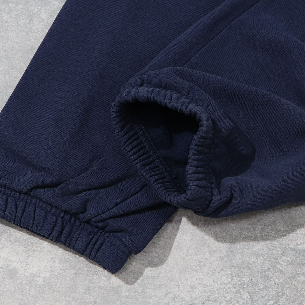 スポーティー&リッチ Sporty&Rich ボトムス ロングパンツ ユニセックス ネイビー コットン 裏起毛 メンズ レディース ロゴプリント スウェットパンツ SRB1PT206