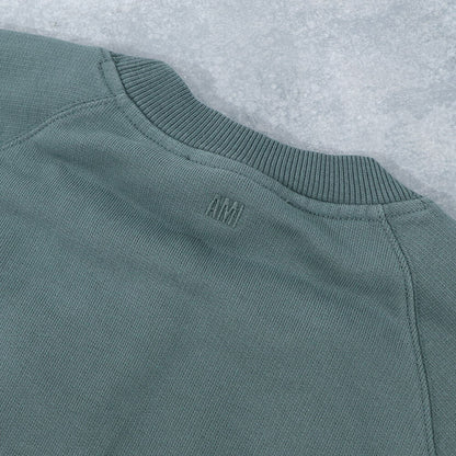 AMI PARIS スウェット ブラック ブルー系 コットン ハートロゴ 刺繍  シンプル USW040.JE0091