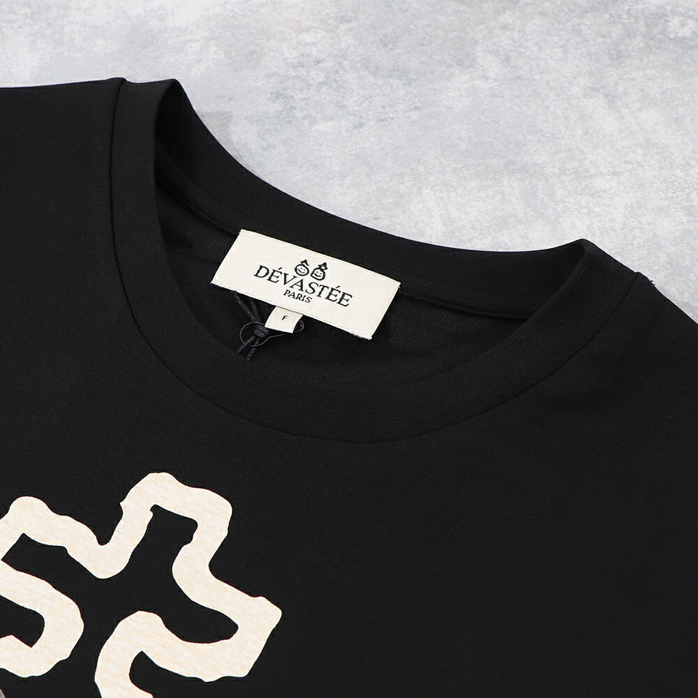 DEVASTEE Tシャツ プリント ロゴ ヘムトップス アシメ