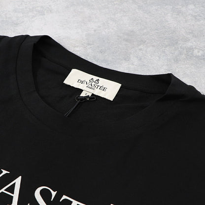 デヴァステ DEVASTEE トップス Tシャツ・カットソー レディース ブラック ホワイト コットン ロゴプリント ヘムトップス アシメトップス シンプル 半袖 R3FWTP017