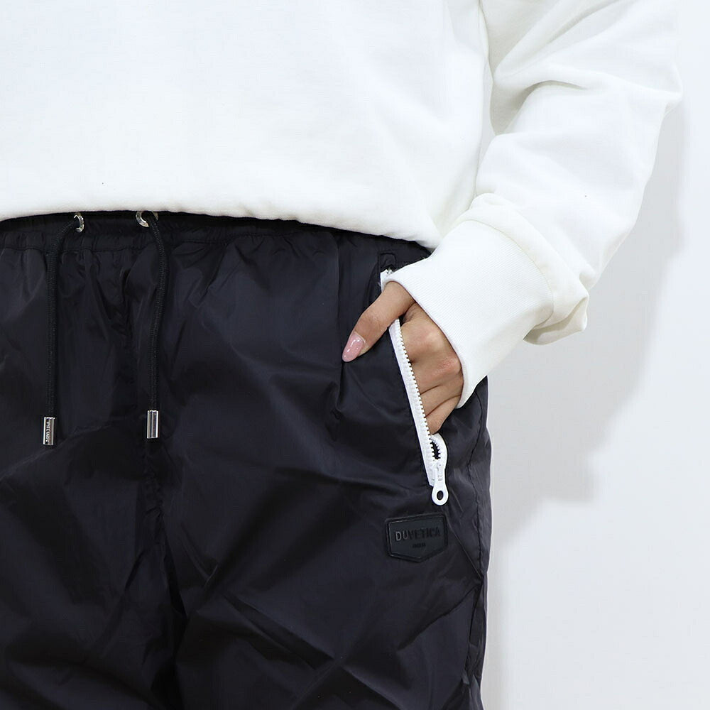 DUVETICA ピンク ブラック ナイロンパンツ ウインドブレーカー VDWP01111