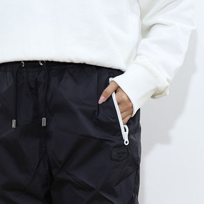 DUVETICA ピンク ブラック ナイロンパンツ ウインドブレーカー VDWP01111