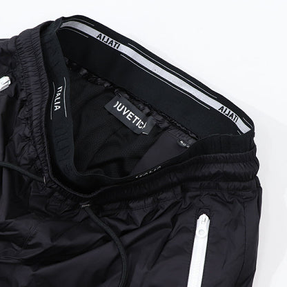 DUVETICA ピンク ブラック ナイロンパンツ ウインドブレーカー VDWP01111