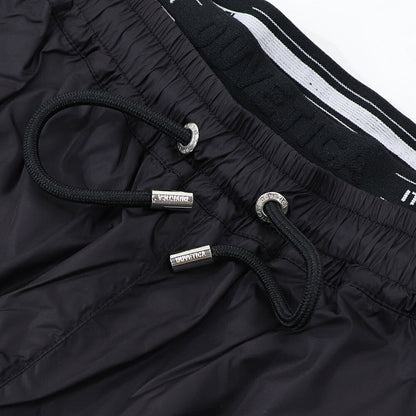 DUVETICA ピンク ブラック ナイロンパンツ ウインドブレーカー VDWP01111