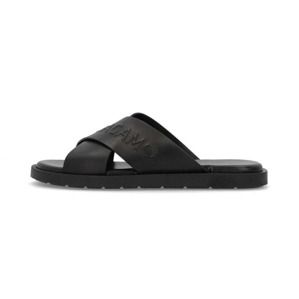 FERRAGAMO サンダル ブラック カーフレザー フラットサンダル ロゴ M CAIO RES 774329