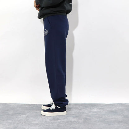 スポーティー＆リッチ Sporty＆Rich ボトムス ロングパンツ ユニセックス ネイビー コットン 裏起毛 メンズ レディース ロゴプリント スウェットパンツ SRB1PT206