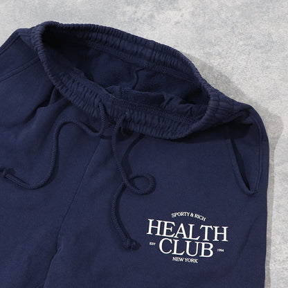 スポーティー＆リッチ Sporty＆Rich ボトムス ロングパンツ ユニセックス ネイビー コットン 裏起毛 メンズ レディース ロゴプリント スウェットパンツ SRB1PT206