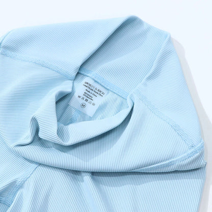 Sporty＆Rich ボトムス ショートパンツ ライトブルー スパッツ