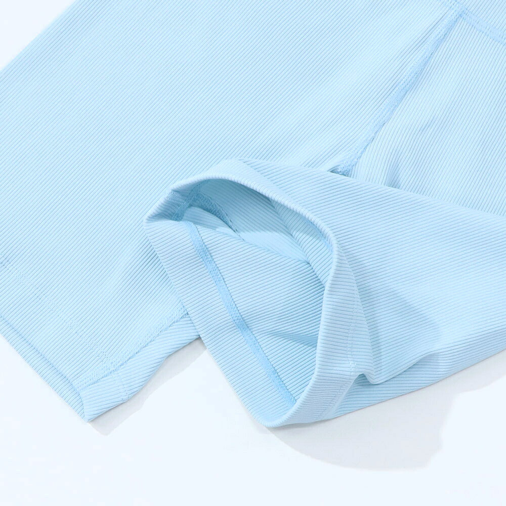 Sporty＆Rich ボトムス ショートパンツ ライトブルー スパッツ