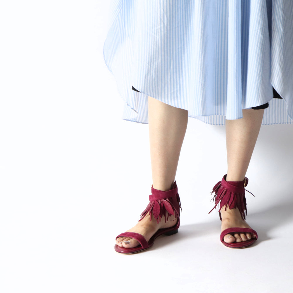 TOD’S フラットサンダル レッド スエード フリンジ付き