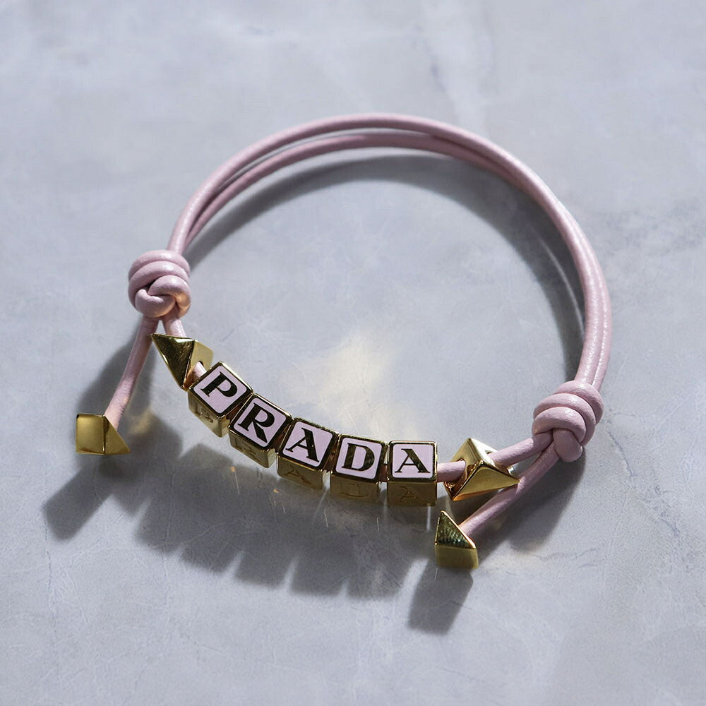 PRADA ブレスレット ブラック ホワイト ライトブルー ライトピンク ロゴ エナメルメタル 1IB522 038