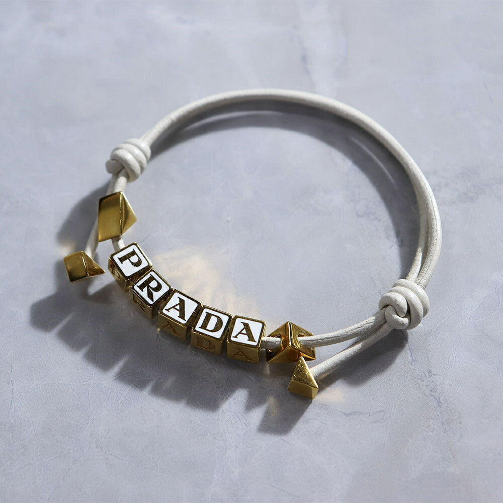 PRADA ブレスレット ブラック ホワイト ライトブルー ライトピンク ロゴ エナメルメタル 1IB522 038