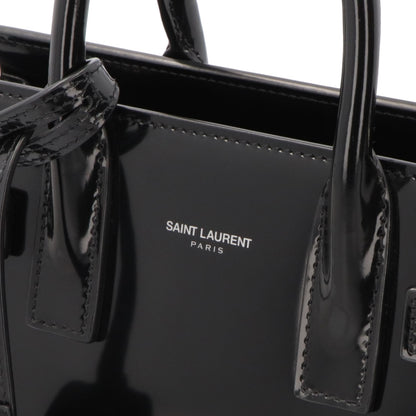 サンローラン SAINT LAURENT バッグ ハンドバッグ レディース サック ドジュール ナノ ブラック パテン トレザー ショルダーバッグ 2way エナメル ロゴ チャーム付き 鞄 398711 AAB9H